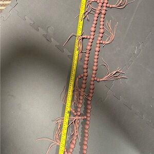 Pink Beaded wood Garland with Leather Tassels
